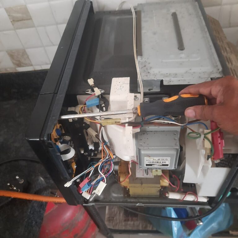 Microvave oven repairing OR Image